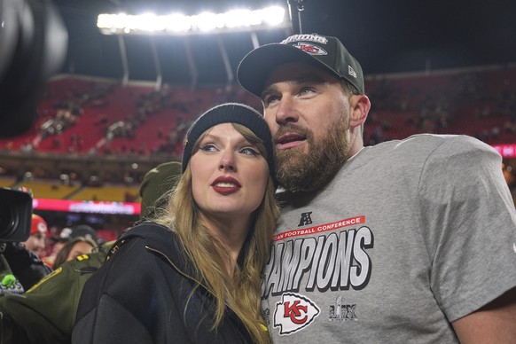 FILE - Kansas City Chiefs tight end Travis Kelce, right, appears with singer Taylor Swift after the Chiefs victory over the Buffalo Bills in the AFC Championship game in Kansas City, Mo., on Jan. 26,  ...