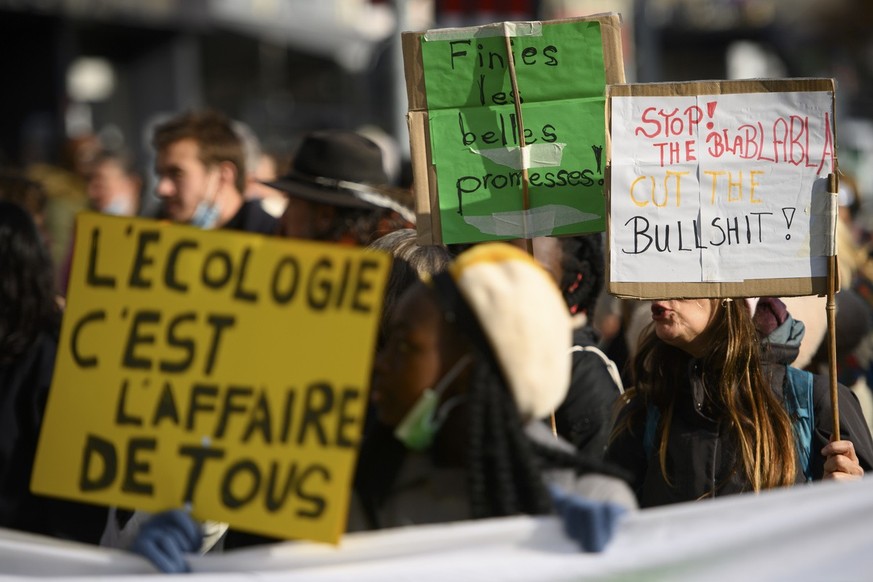 People demonstrate during a demonstration &quot;26 years of COP: only words in the air! for a popular ecology!&quot; to protest a lack of climate awareness during the COP26 U.N. Climate Summit, in Lau ...