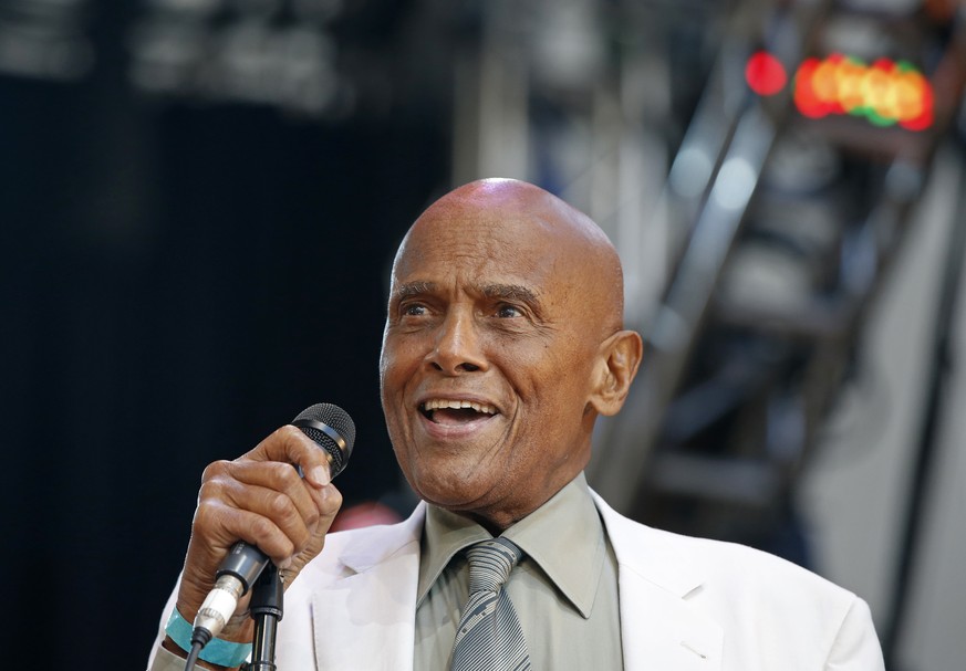 FILE - Singer and activist Harry Belafonte speaks during a memorial tribute concert for folk icon and civil rights activist Pete Seeger in New York on July 20, 2014. Belafonte died Tuesday of congesti ...