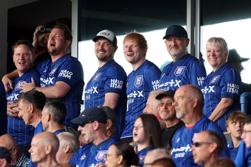 IPSWICH, ENGLAND - AUGUST 17: Ed Sheeran, English singer-songwriter and minority shareholder of Ipswich Town FC looks on prior to the Premier League match between Ipswich Town FC and Liverpool FC at P ...