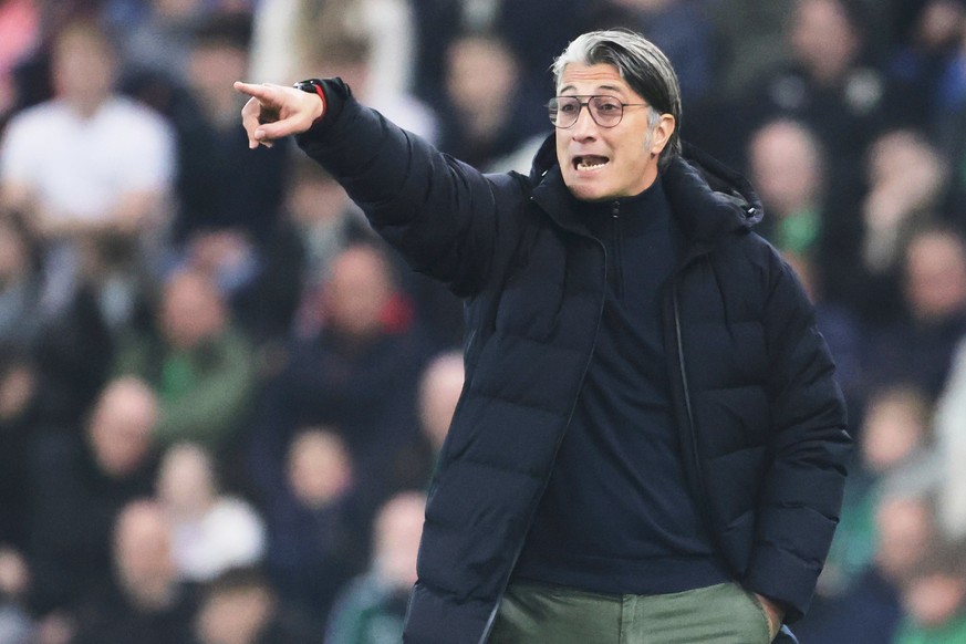 FILE - Switzerland's coach Murat Yakin gives instructions to his players during the international friendly soccer match between Northern Ireland and Switzerland at Windsor Park stadium, in Belfas ...