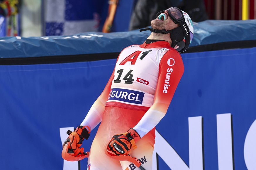 epa11738005 Daniel Yule of Switzerland reacts in the finish area during the second run of the Men&#039;s Slalom race of the FIS Alpine Skiing World Cup in Gurgl, Austria, 24 November 2024. EPA/ANNA SZ ...