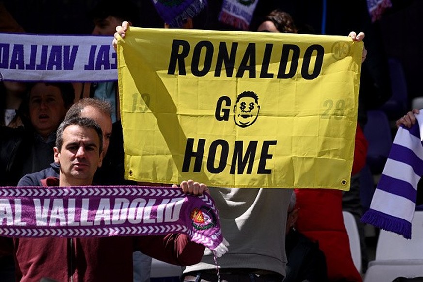 VALLADOLID, SPAIN - APRIL 20: A Real Valladolid CF fan holds up a sign in protest of the clubs president Ronaldo Nazário de Lima (not pictured), which reads &quot;Ronaldo Go Home&quot; prior to the La ...