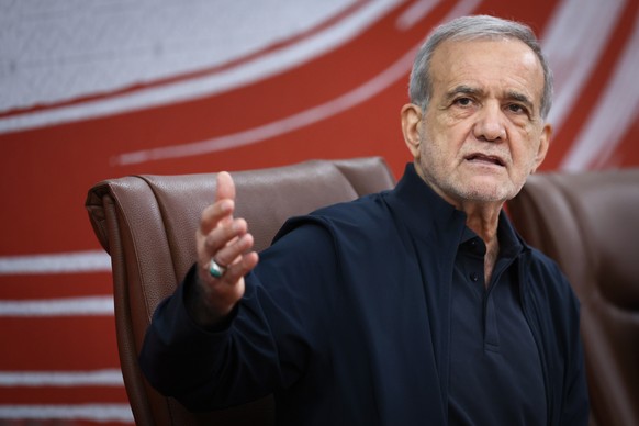 epa13156858 A handout photo made available by the Iranian Presidential Office shows Iranian President Masoud Pezeshkian attending a press conference in Tehran, Iran, 08 August 2026, on the occasion of ...