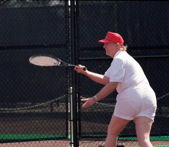 American real estate developer Donald Trump plays tennis at the Cap-Cure Pro-Am Invitational Tennis Tournament held on the Mar-a-Lago estate, Palm Beach, Florida, February 13, 2000. (Photo by Davidoff ...