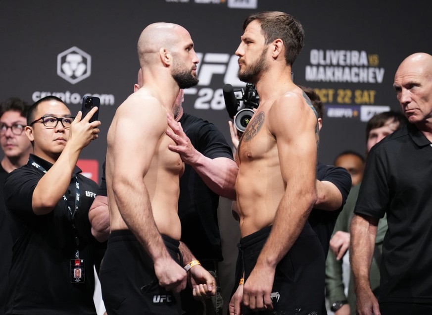 ABU DHABI, UNITED ARAB EMIRATES - OCTOBER 21: (L-R) Opponents Volkan Oezdemir of Switzerland and Nikita Krylov of Ukraine face off during the UFC 280 ceremonial weigh-in at Etihad Arena on October 21, ...