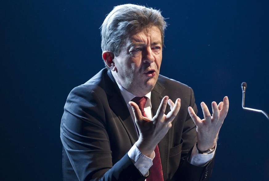 epa03169238 French far-left political party &#039;Front de Gauche&#039; candidate for the 2012 French presidential election, Jean-Luc Melenchon, delivers a speech during a rally held at the Bataclan c ...