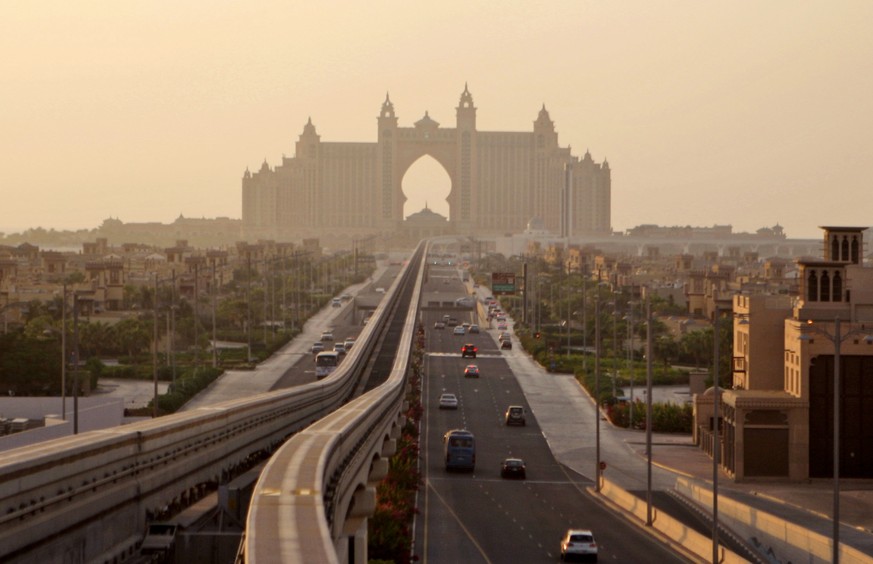 FILE - This Sept. 8, 2010 file photo shows an avenue leading to the Atlantis hotel on the Palm Jumeirah Island in Dubai, United Arab Emirates. The Middle East is the most water-scarce region in the wo ...