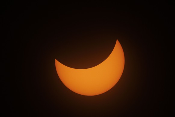 epa11266512 The moon is seen in front of the sun after the total solar eclipse over Huntington, Vermont, USA, 08 April 2024. Vermont State officials are expecting over 150,000 visitors to the region t ...