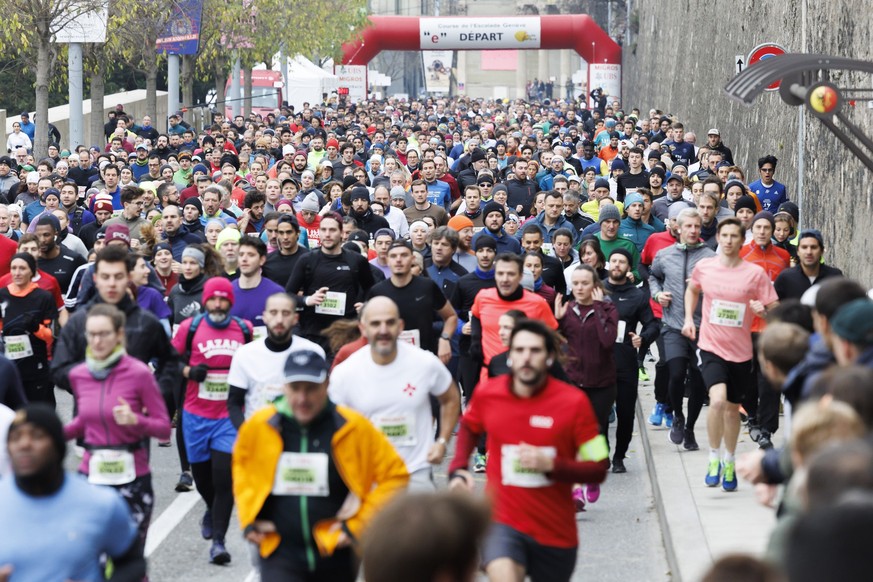 Participants take the start during the 44th Escalade Race (Course de l&#039;Esacalde), in Geneva, Switzerland, Saturday, December 3, 2022. Over 45&#039;000 participants run at the Course de l&#039;Esc ...