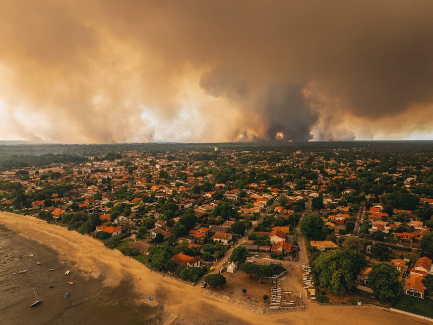 Wildfires in France - The Town Of Ares Is Forced To Evacuate Its Entire Population Drone photo - After Cap Ferret, the town of Ares in Gironde is forced to evacuate its entire population, on July 23,  ...