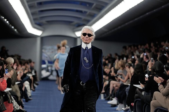 TOKYO, JAPAN - MARCH 22: Designer Karl Lagerfeld walks on the runway during the Chanel 2012 Spring/Summer Haute Couture Collection Show at Shinjuku Gyoen Park on March 22, 2012 in Tokyo, Japan. (Photo ...