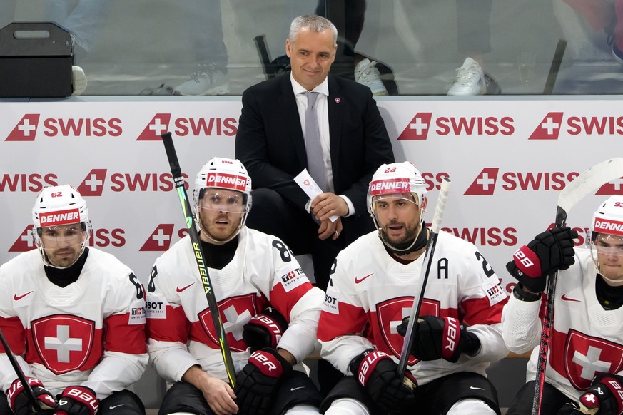 Jan Cadieux, head coach of Switzerland, and from left Switzerland's Denis Malgin, Switzerland's Christoph Bertschy, Switzerland's Nino Niederreiter and Switzerland's Theo Rochette  ...