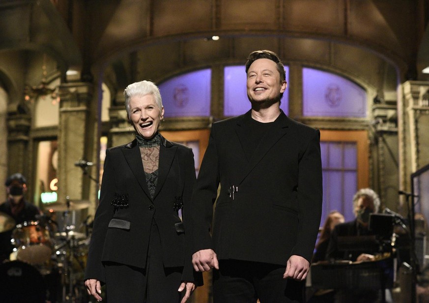 This image released by NBC shows host Elon Musk with his mother Maye as he delivers his opening monologue on &quot;Saturday Night Live&quot; in New York on May 8, 2021. (Will Heath/NBC via AP)