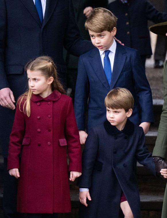 SANDRINGHAM, NORFOLK - DECEMBER 25: Prince George, Princess Charlotte and Prince Louis attend the Christmas Day service at Sandringham Church on December 25, 2022 in Sandringham, Norfolk. King Charles ...