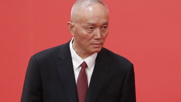 epa10260292 New member of the Standing Committee of the Political Bureau of the 20th Chinese Communist Party (CPC) Central Committee Cai Qi looks on during a press conference at the Great Hall of Peop ...