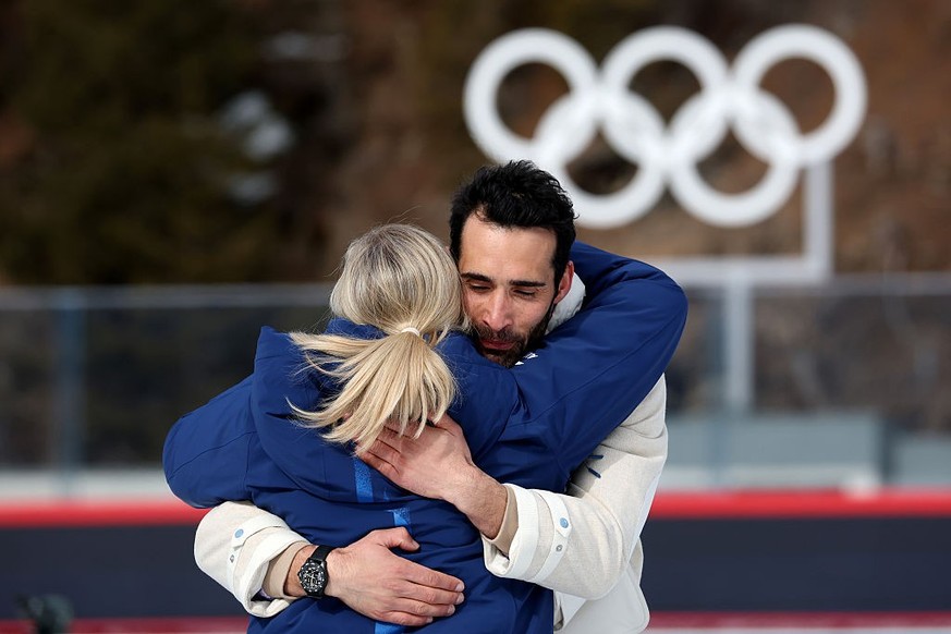 ANTHOLZ-ANTERSELVA, ITALY - FEBRUARY 15: Gold medalist Martin Fourcade of Team France is embraced by Kirsty Coventry, President of IOC, during the reallocation ceremony for Vancouver 2010 Olympic Wint ...
