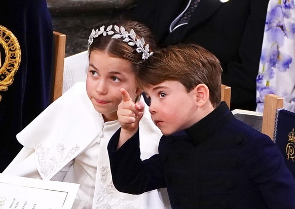 LONDON, ENGLAND - MAY 06: Britain&#039;s Prince Louis and Princess Charlotte attend the Coronation of King Charles III and Queen Camilla at Westminster Abbey on May 6, 2023 in London, England. The Cor ...