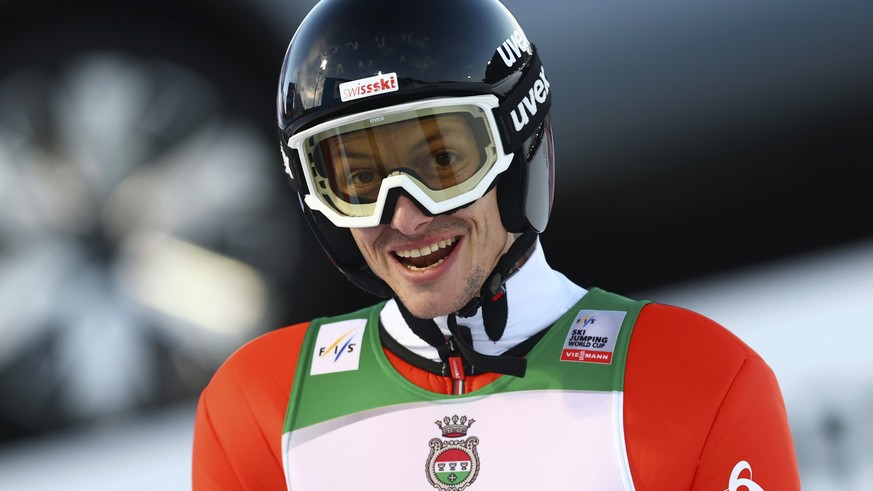 epa11801570 Gregor Deschwanden of Switzerland reacts during the Round 2 in the second stage of the 73rd Four Hills Ski Jumping Tournament in Garmisch-Partenkirchen, Germany, 01 January 2025. EPA/ANNA  ...