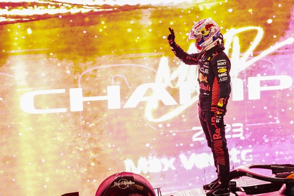epa10906314 Dutch Formula One driver Max Verstappen of Red Bull Racing celebrates winning the 2023 Formula One Championship after the Sprint race at the Lusail International Circuit racetrack in Lusai ...