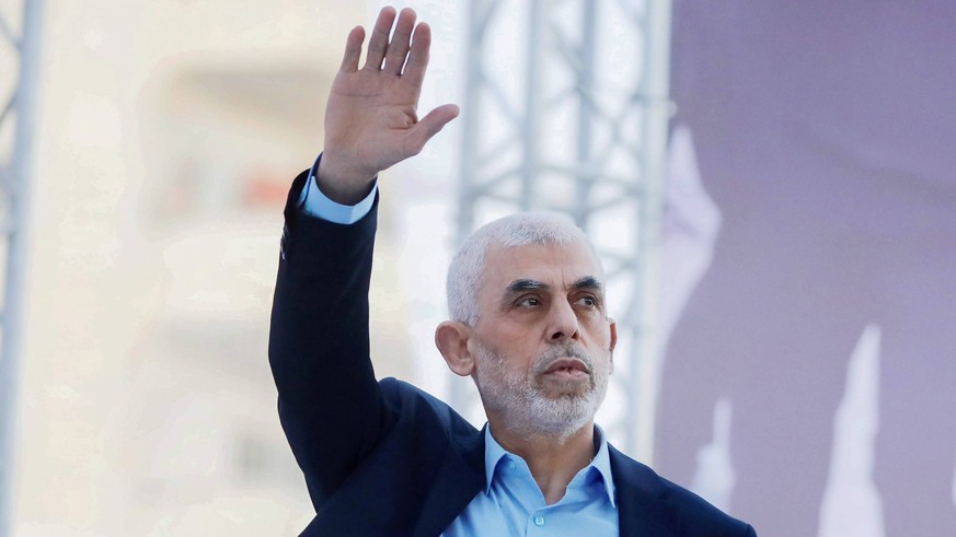 April 14, 2023, Gaza, Palestine: Yahya Sinwar, head of the Palestinian Islamic movement Hamas in the Gaza Strip, waves his hand to the crowd during the celebration of International Quds Day in Gaza Ci ...