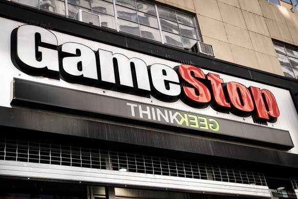 FILE - Pedestrians pass a GameStop store on 14th Street at Union Square, Thursday, Jan. 28, 2021, in the Manhattan borough of New York. Meme stock GameStop is gearing up to name Ryan Cohen as its chai ...