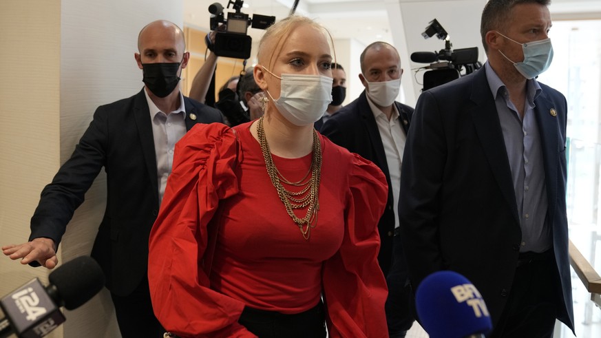 The teenager identifying herself online as Mila leaves at the courtroom Thursday, June 3, 2021 in Paris. Thirteen people went on trial Thursday in Paris accused of cyberbullying or death threats again ...