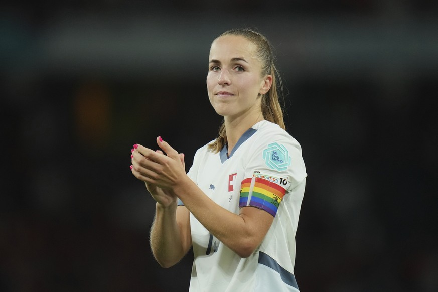 Switzerland&#039;s Lia Waelti, wearing a team captain rainbow armband, applauds the fans at the end of the Women&#039;s Euro 2025 quarterfinals soccer match between Spain and Switzerland at Stadion Wa ...