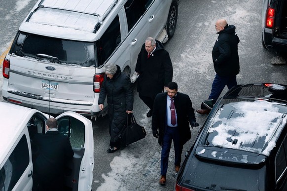 DES MOINES, IOWA - JANUARY 15: Republican presidential candidate, former U.S. President Donald Trump&#039;s senior campaign advisors Susie Wiles (C) and Chris LaCivita (R) leave a meeting with Trump o ...