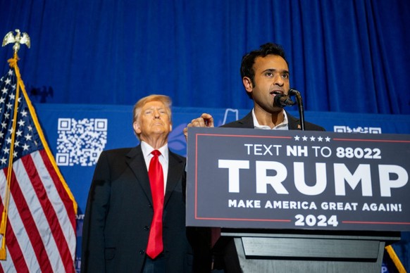 ATKINSON, NEW HAMPSHIRE - JANUARY 16: U.S. entrepreneur Vivek Ramaswamy endorses Republican presidential candidate, former U.S. President Donald Trump during a campaign rally at the Atkinson Country C ...