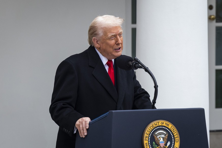 epa12548212 US President Donald Trump speaks before pardoning a turkey named Gobble in the Rose Garden of the White House in Washington, DC, USA, 25 November 2025. The annual White House tradition of  ...