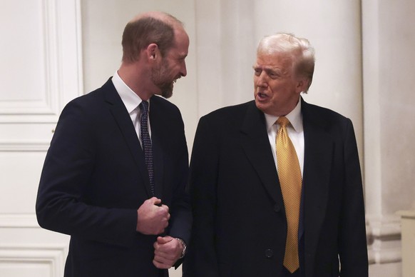 PARIS, FRANCE - DECEMBER 7: U.S. President-elect Donald Trump meets Britain&#039;s Prince William, Prince of Wales at the UK Ambassador&#039;s Residence on the day of the reopening ceremonies of the N ...