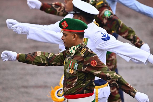 LONDON, ENGLAND - MAY 06: Bangladesh infantry and Navy Sailors can be seen on The Mall during the Coronation of King Charles III and Queen Camilla on May 06, 2023 in London, England. The Coronation of ...