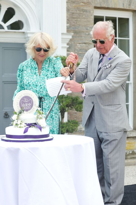 ASCOT, UNITED KINGDOM - JUNE 22: (EMBARGOED FOR PUBLICATION IN UK NEWSPAPERS UNTIL 24 HOURS AFTER CREATE DATE AND TIME) Queen Camilla is visibly emotional after her horse 'Desert Hero' (whic ...