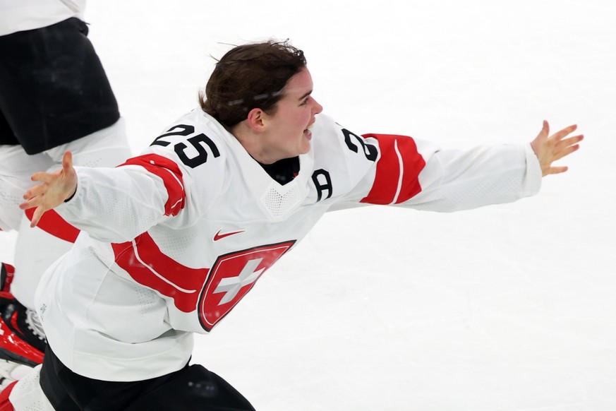 epa12758079 Alina Muller of Switzerland celebrates after scoring the winning goal during the Women's Ice Hockey bronze medal match between Switzerland and Sweden at the Milano Cortina 2026 Winter ...