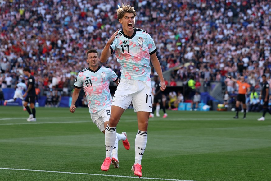 Belgium's Charles De Ketelaere (17) celebrates after scoring his side's opening goal during the World Cup round of 16 soccer match between the United States and Belgium in Seattle, Monday, J ...
