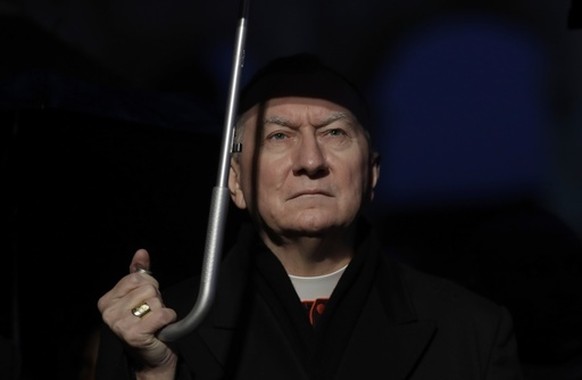 FILE - Vatican Secretary of State Cardinal Pietro Parolin attends a ceremony where the Colosseum is lit up in red to draw attention to the persecution of Christians around the world, in Rome, Saturday ...