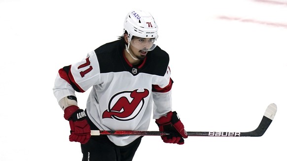 New Jersey Devils defenseman Jonas Siegenthaler (71) during an NHL hockey game, Friday, April 8, 2022, in Boston. (AP Photo/Charles Krupa)