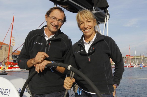 Swiss skipper Dominique Wavre, left, with French skipper Michele Paret on their boat Mirabaud in the French harbour of Le Havre, western France, Saturday Oct. 29, 2011 ahead of the start of the two-ha ...