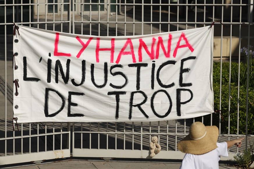 epa13024932 A banner reads 'Lyhanna too much injustice' during a protest in front of the court house of Montpellier in Southern France, 08 June 2026. Several feminist and child advocacy orga ...