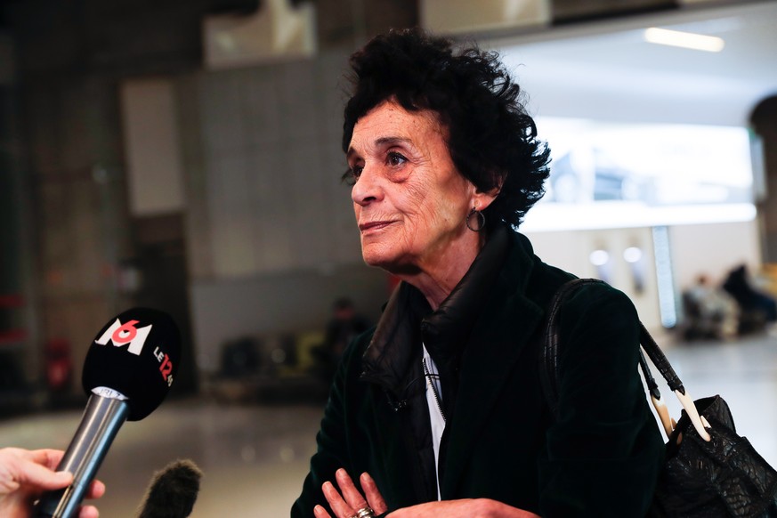 epa10377460 Isabelle Coutant Peyre, lawyer of French serial killer Charles Sobhraj, speaks to the press before his arrival at Charles de Gaulle airport in Paris, France, 24 December 2022. Charles Sobh ...