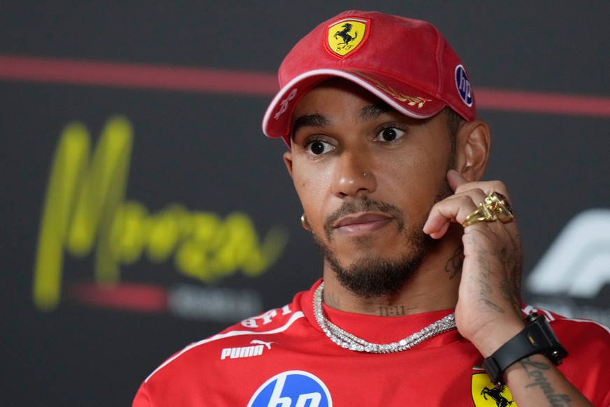 Ferrari driver Lewis Hamilton of Britain gestures during a news conference ahead of Sunday's Italy Grand Prix, at the Monza racetrack, Italy, Thursday, Sept. 3, 2026. (AP Photo/Luca Bruno)