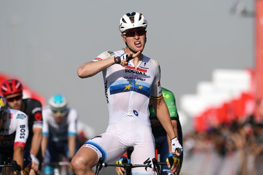 DUBAI, UNITED ARAB EMIRATES - FEBRUARY 21: Tim Merlier of Belgium and Team Soudal Quick-Step celebrates at finish line as stage winner during the 7th UAE Tour 2025, Stage 5 a 160km stage from American ...
