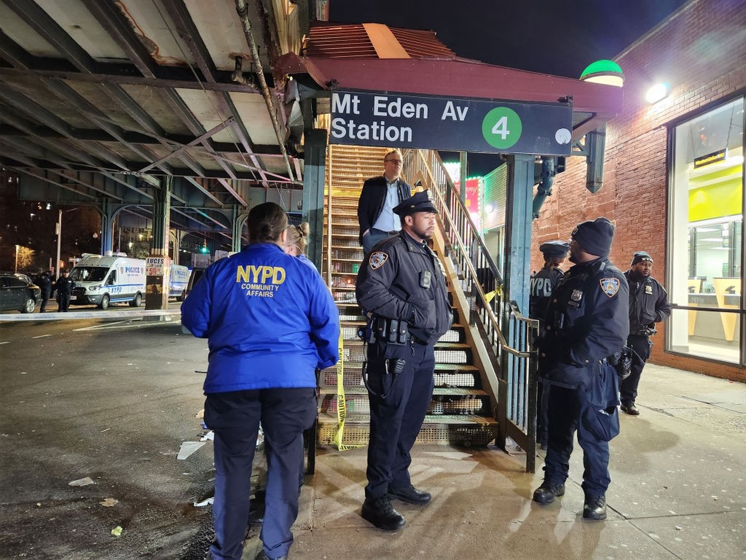 Members of the New York Police Department secure the scene of a shooting inside the Mount Eden subway station on the No. 4 line in the Bronx, Monday, Feb. 12, 2024. (Gardiner Anderson/New York Daily N ...