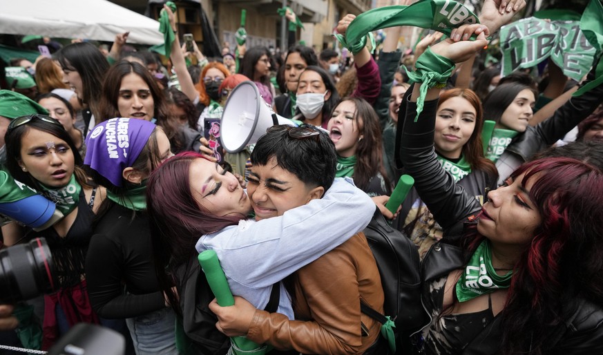 Abortion-rights activists celebrate after the Constitutional Court approved the decriminalization of abortion, lifting all limitations on the procedure until the 24th week of pregnancy, in Bogota, Col ...