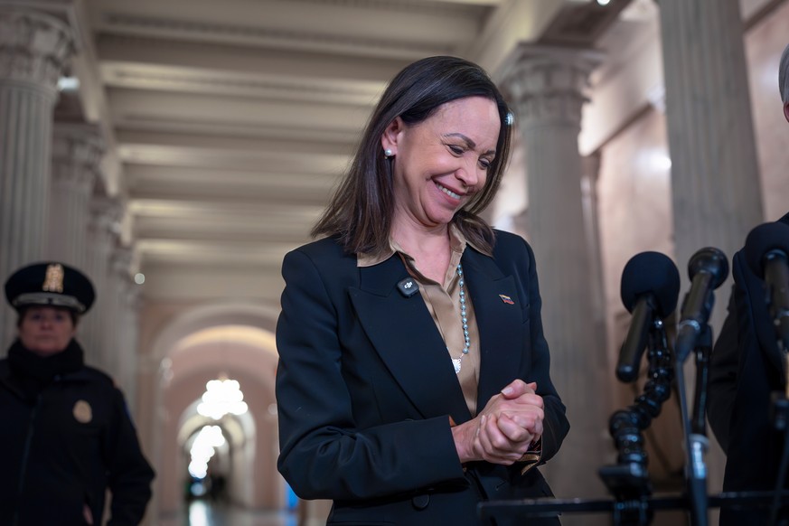 KEYPIX - Venezuelan opposition leader Maria Corina Machado speaks to reporters after meeting with Rep. Mario Diaz-Balart, R-Fla., and Rep. Carlos Gimenez, R-Fla., at the Capitol in Washington, Tuesday ...