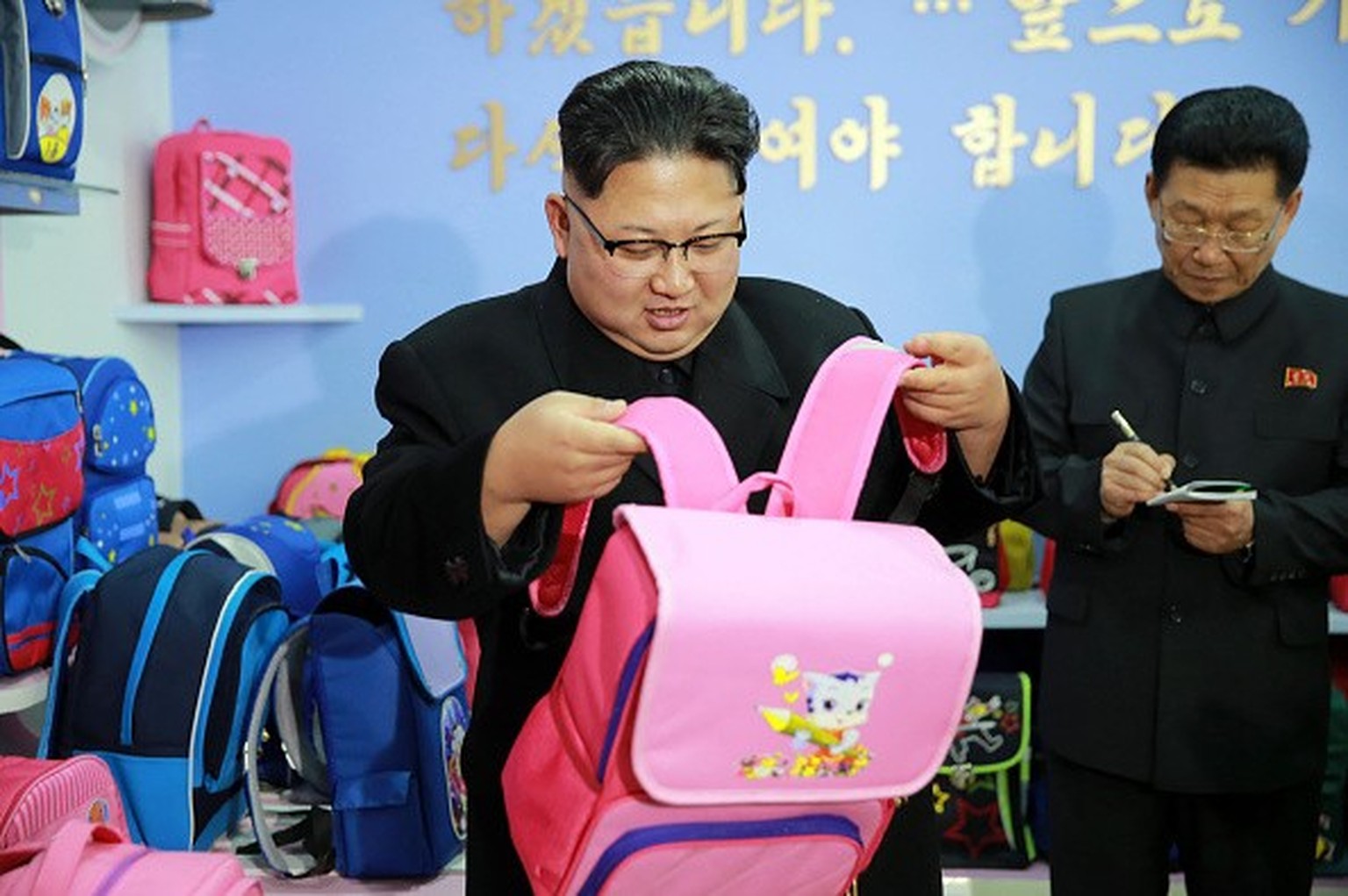 This undated picture released from North Korea's official Korean Central News Agency (KCNA) on January 5, 2017 shows North Korean leader Kim Jong-Un (L) inspecting the newly-built Pyongyang b ...