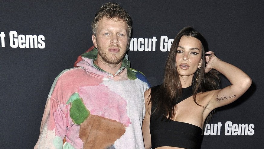 Sebastian Bear-McClard, left, and Emily Ratajkowski attend the LA premiere of &quot;Uncut Gems&quot; at ArcLight Hollywood on Wednesday, Dec. 11, 2019, in Los Angeles. (Photo by Richard Shotwell/Invis ...