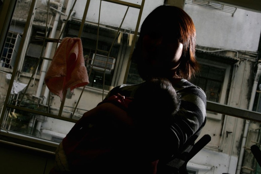 Drug addicts mother Kit (who does not want to show her real name and her face) express her experience on taking drug and methdone during pregnancy at HK Drug Rehab Centre, Sham Shui Po. 22 OCTOBER 200 ...