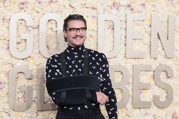 epa11063346 Chilean-American actor Pedro Pascal arrives for the 81st annual Golden Globe Awards ceremony at the Beverly Hilton Hotel in Beverly Hills, California, USA, 07 January 2024. Artists in vari ...